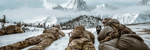 soldiers lying in snow